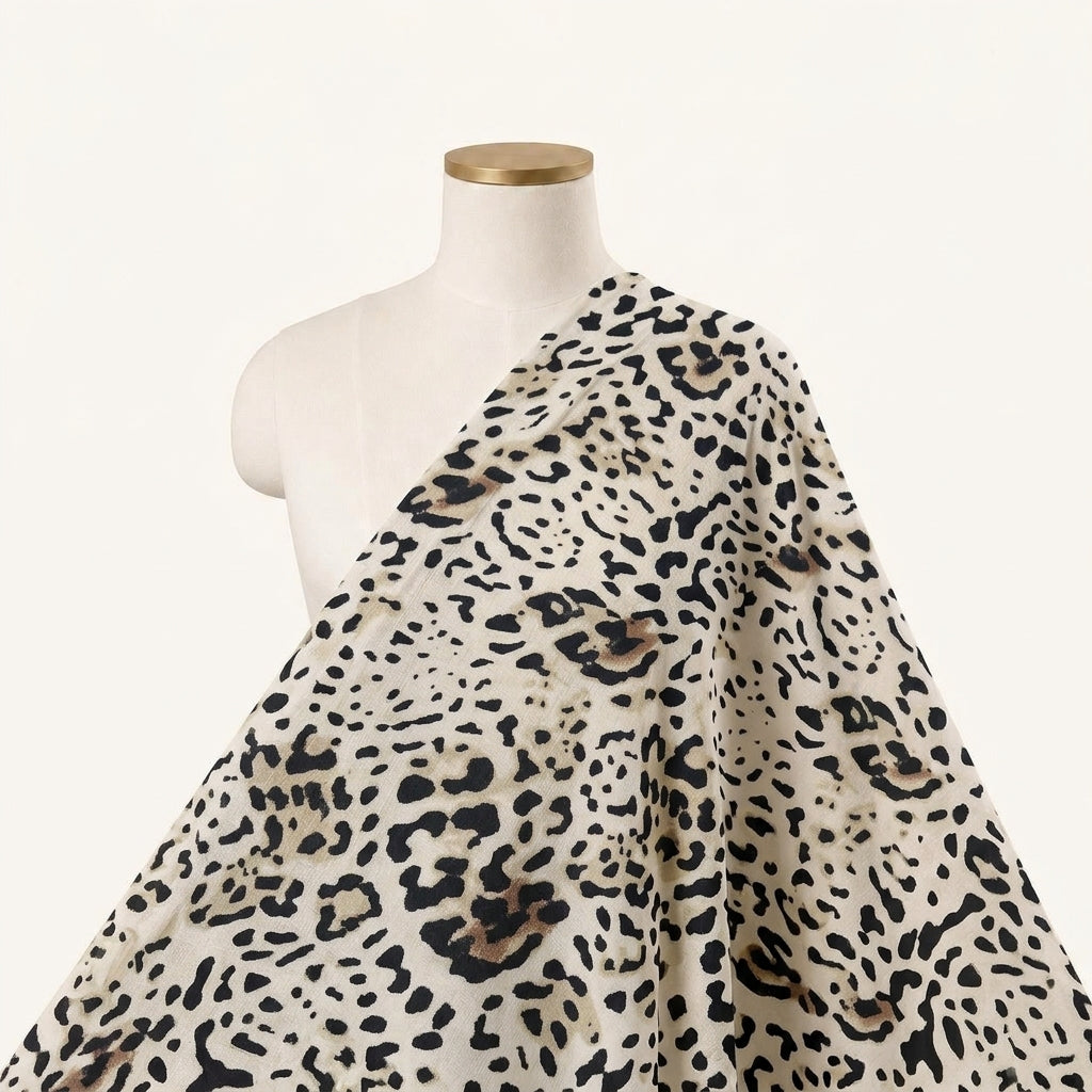 Animal Print White Animal Print Lycra Fabric Draped as a saree