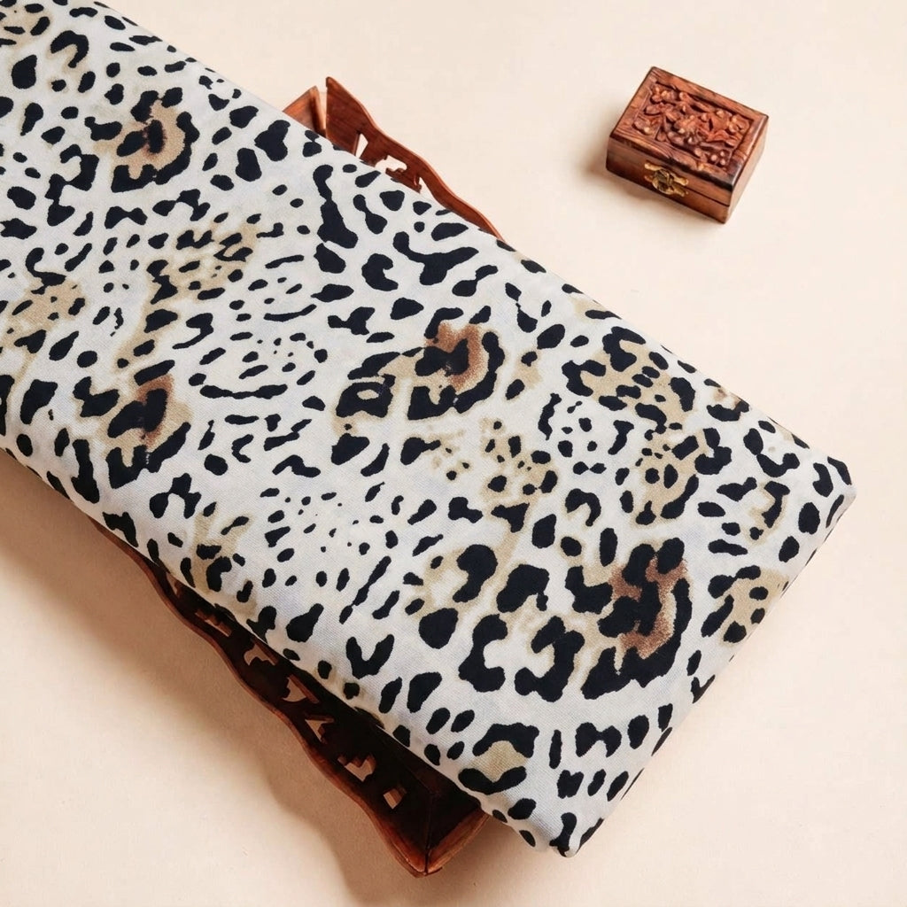 Folded White Animal Print Lycra Fabric Highlighting and Texture