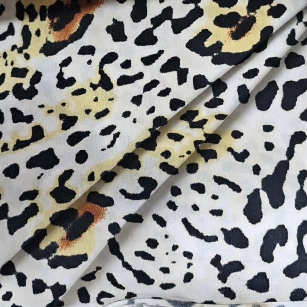 Folded Animal Print White Animal Print Lycra Fabric