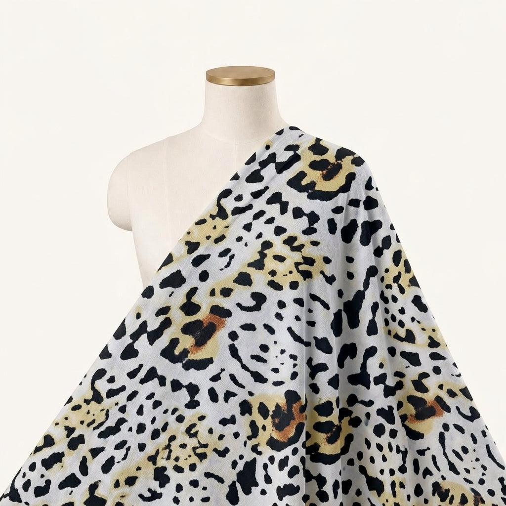 Animal Print White Animal Print Lycra Fabric Draped as a saree