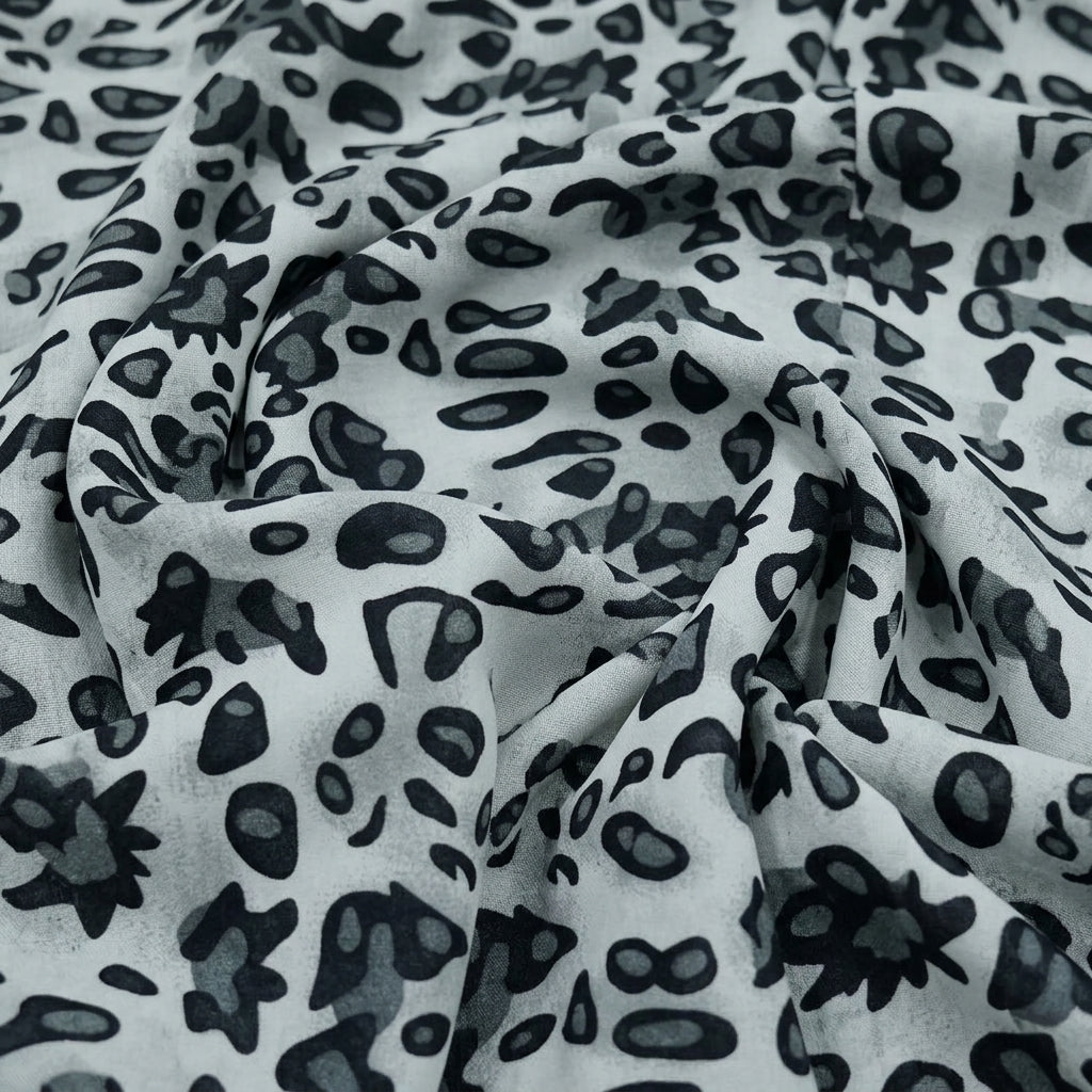 Swirled Animal Print White Animal Print Lycra Fabric