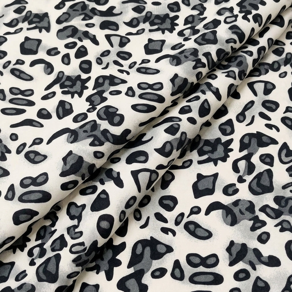 Folded Animal Print White Animal Print Lycra Fabric