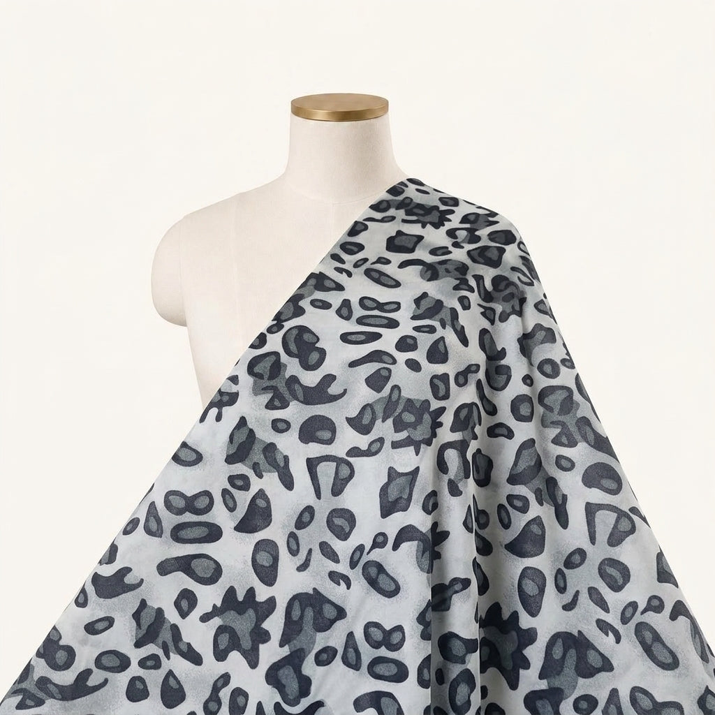 Animal Print White Animal Print Lycra Fabric Draped as a saree