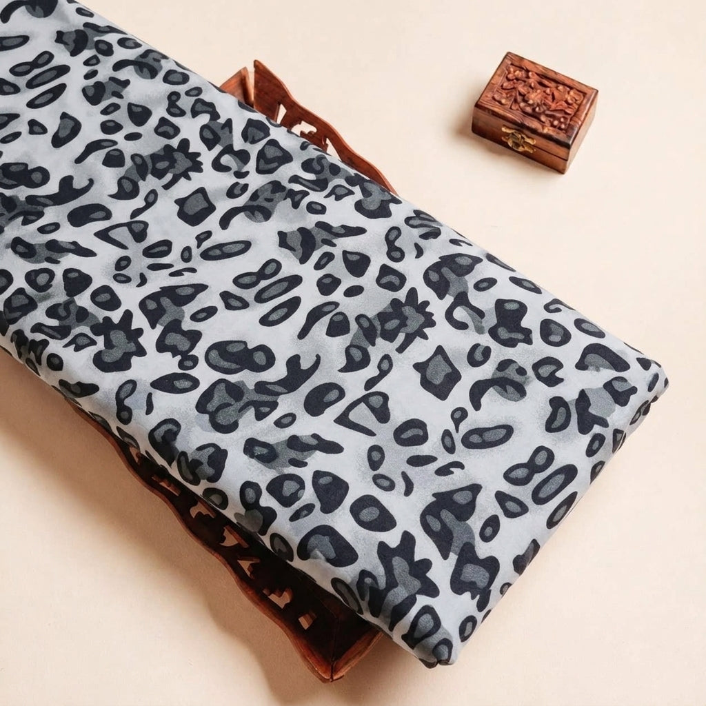 Folded White Animal Print Lycra Fabric Highlighting and Texture