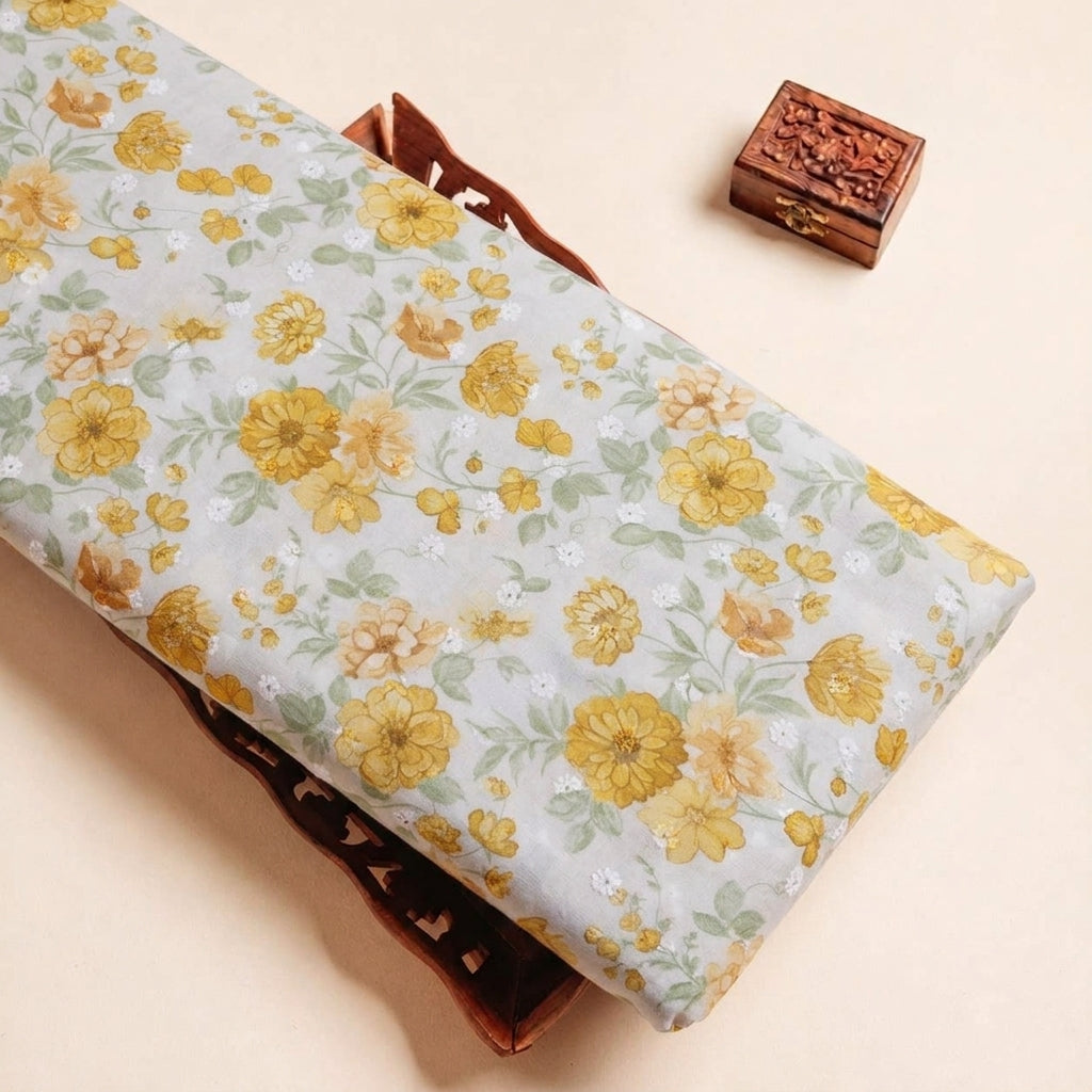 Folded Yellow Embroidery Cotton Fabric Highlighting Thread Work Floral and Texture