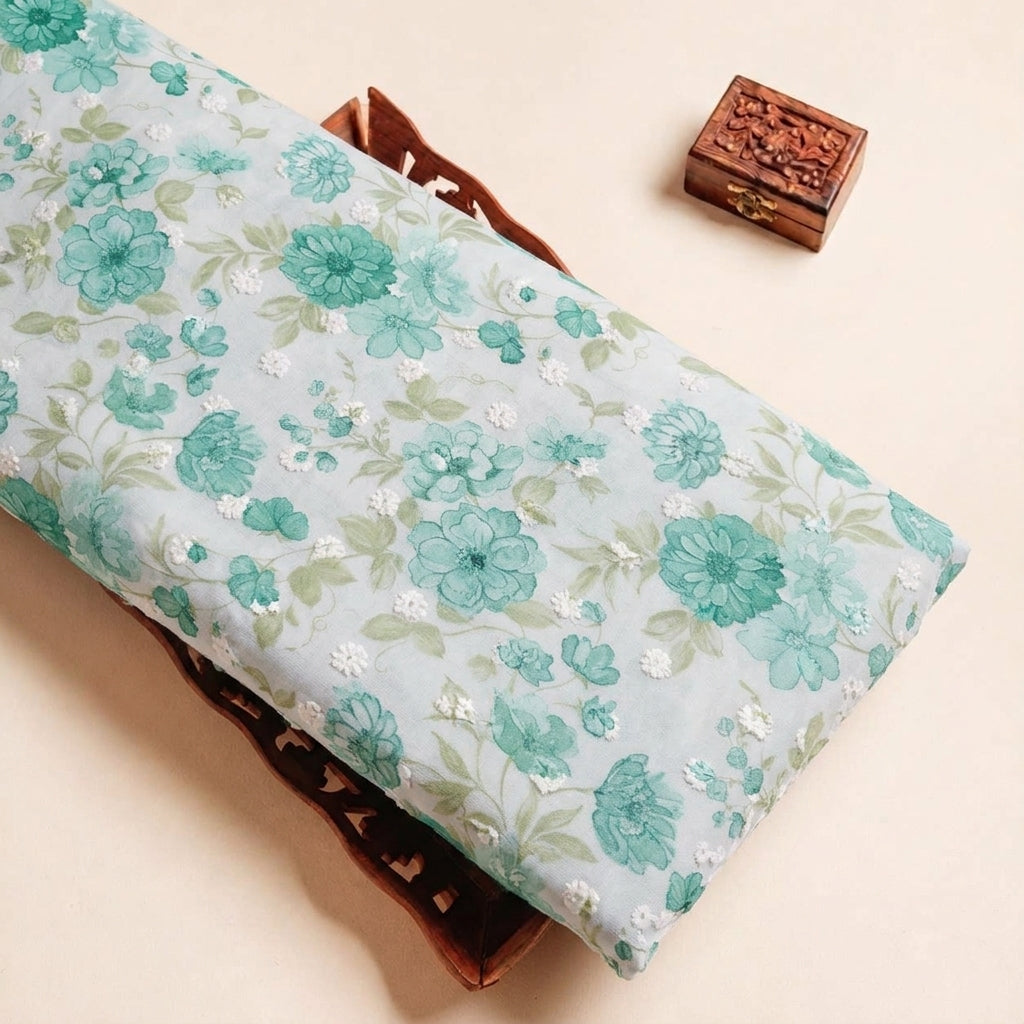 Folded Green Embroidery Cotton Fabric Highlighting Thread Work Floral and Texture