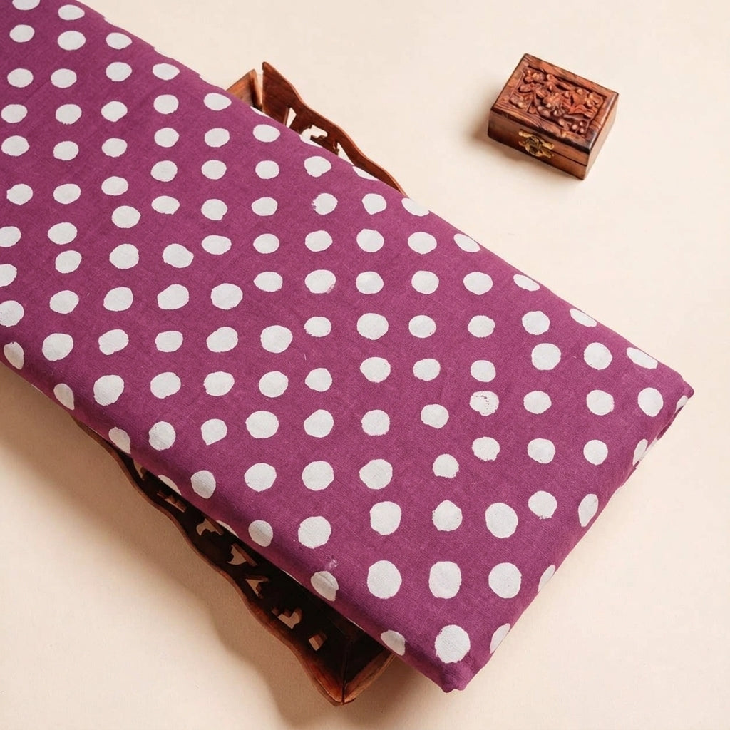 Folded Pink Polka Dots Cotton Fabric Highlighting Polka Dots and Texture