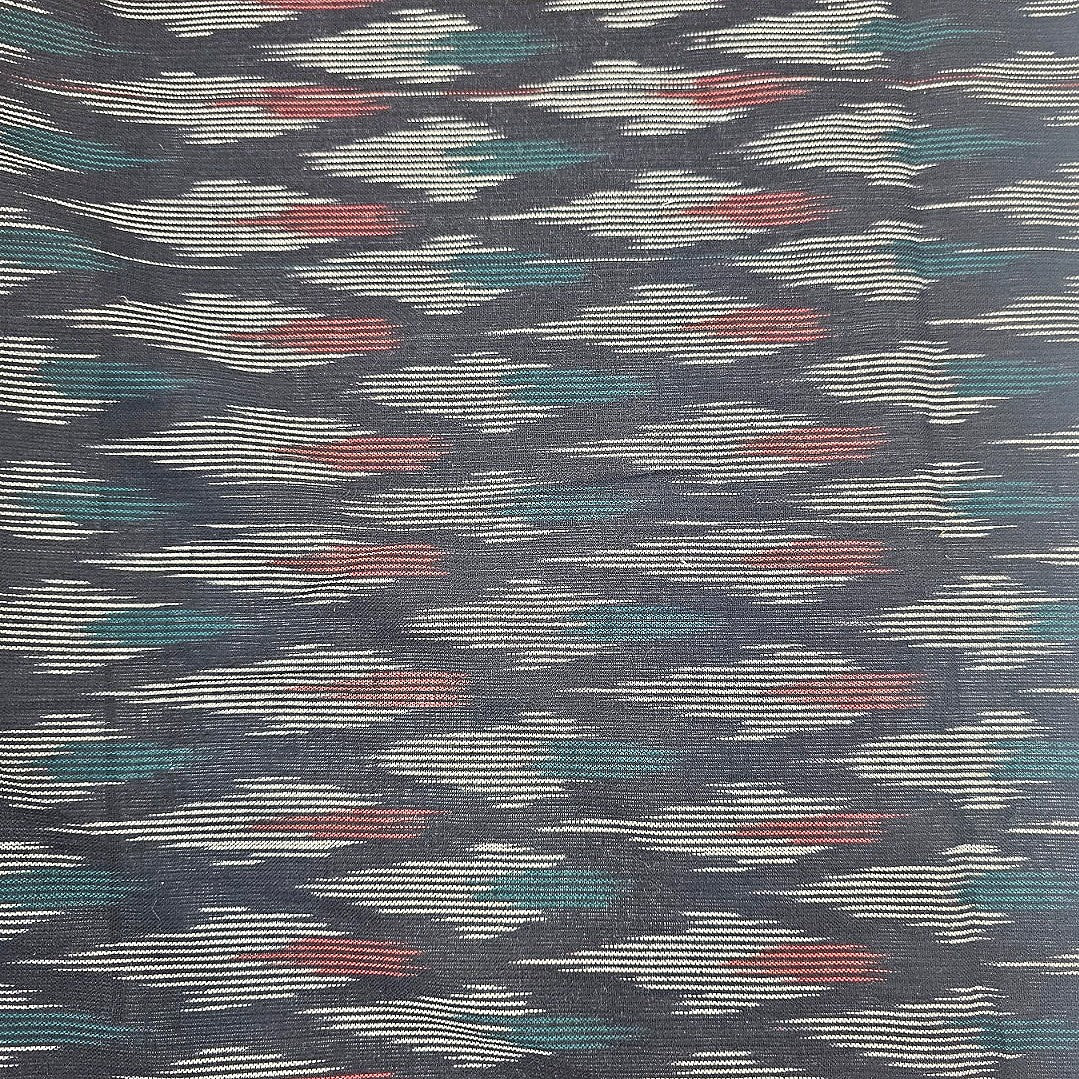 Ikat Black Ikat Cotton Fabric Draped as a saree