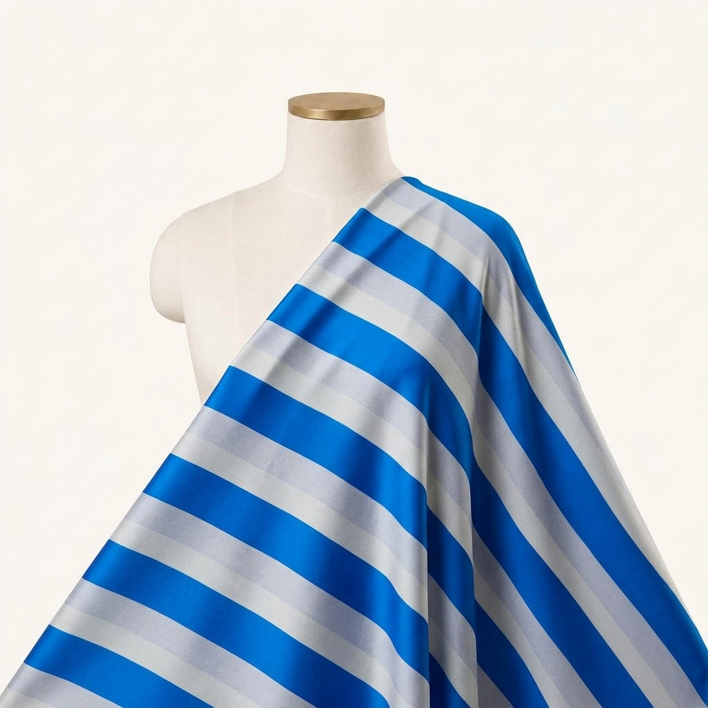 Stripes Blue Stripes Satin Fabric Draped as a saree