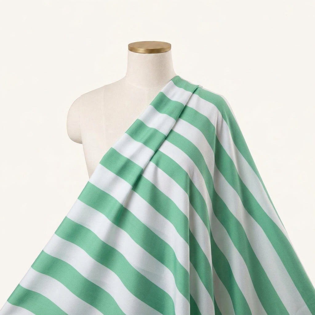 Stripes Green Stripes Satin Fabric Draped as a saree