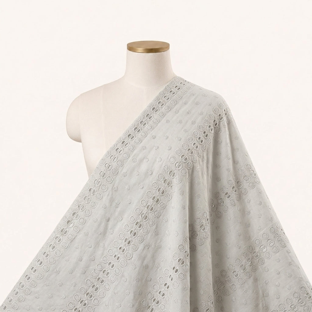 Cutwork Green Cutwork Cotton Fabric Draped as a saree