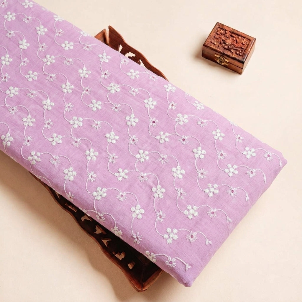 Folded Pink Embroidery Cotton Fabric Highlighting Thread Work Floral and Texture