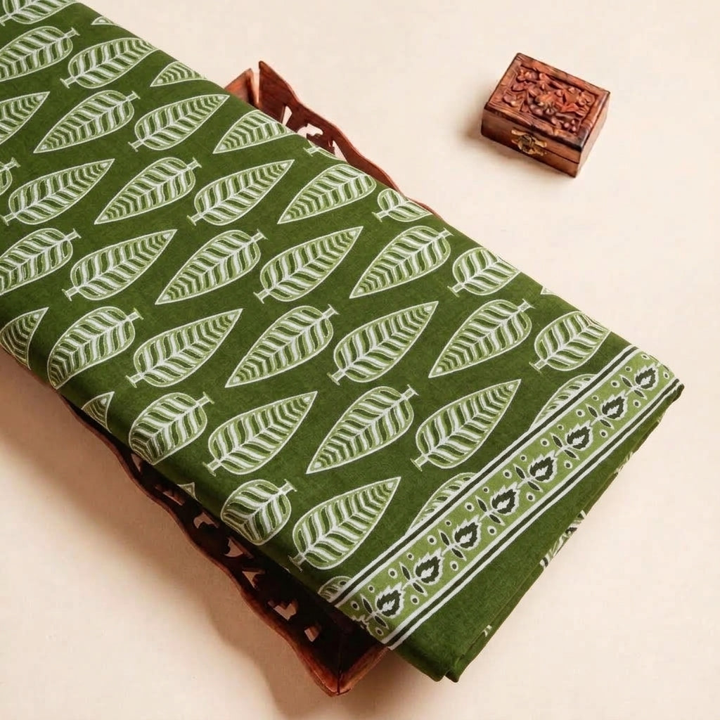 Folded Green Leaf Cotton Fabric Highlighting Border and Texture