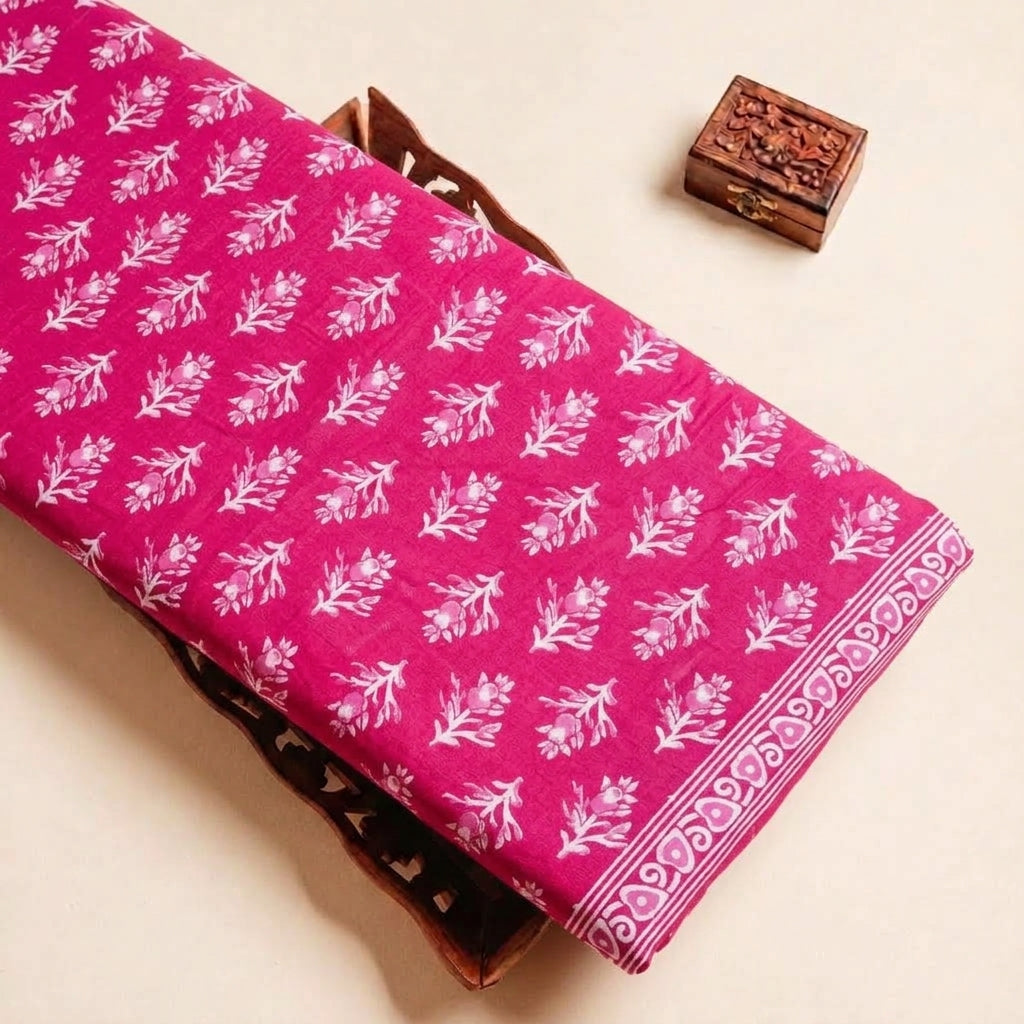 Folded Pink Floral Cotton Fabric Highlighting Border and Texture