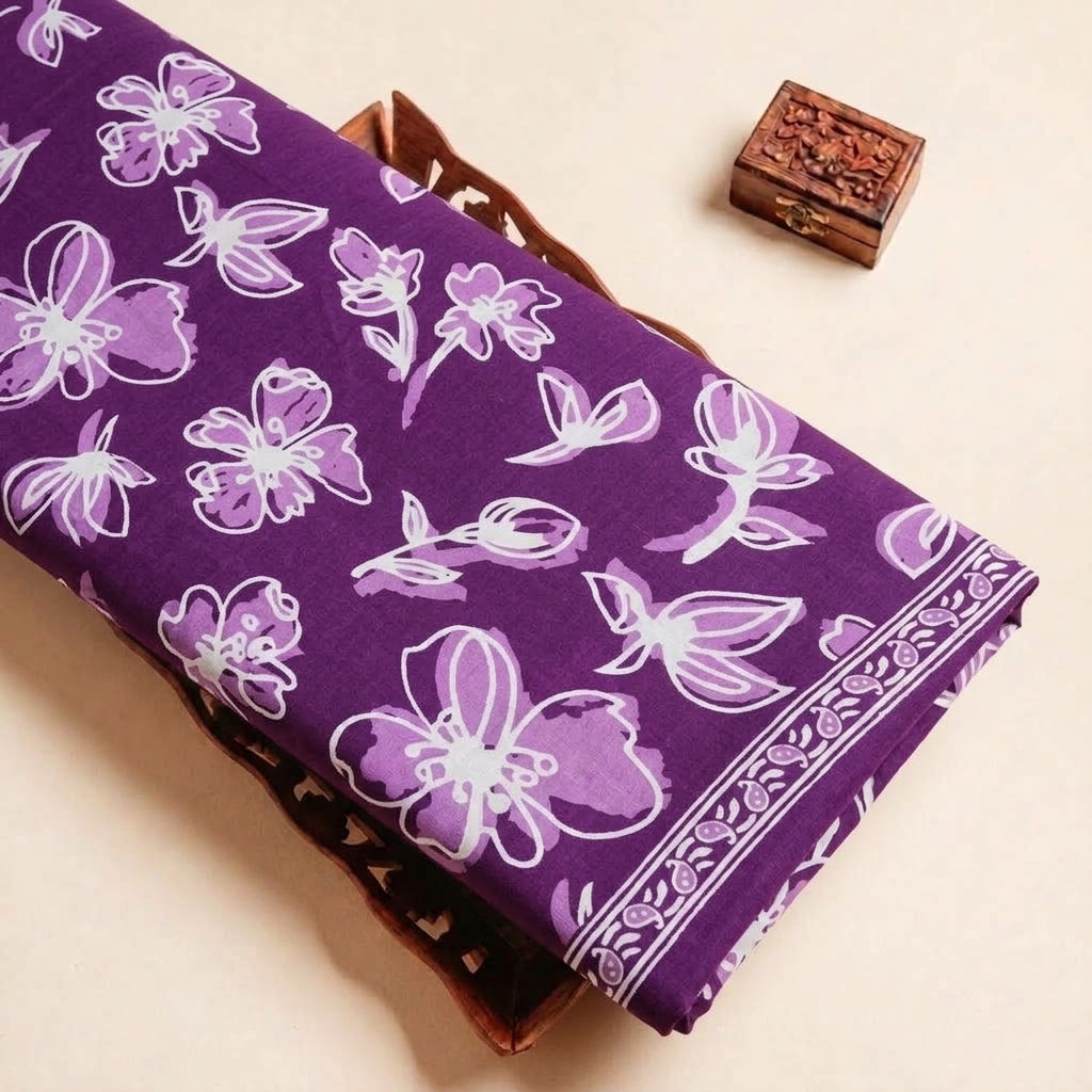 Folded Purple Floral Cotton Fabric Highlighting Border and Texture