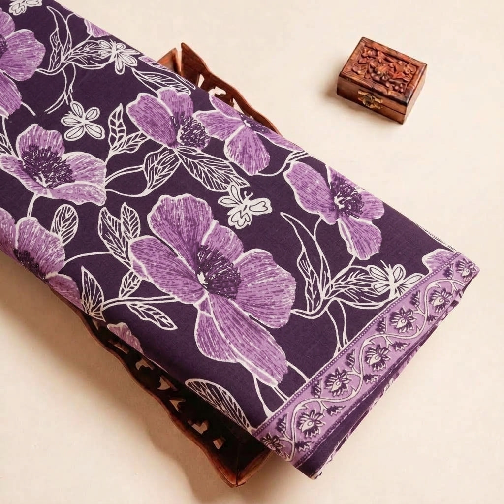 Folded Purple Floral Cotton Fabric Highlighting Border and Texture