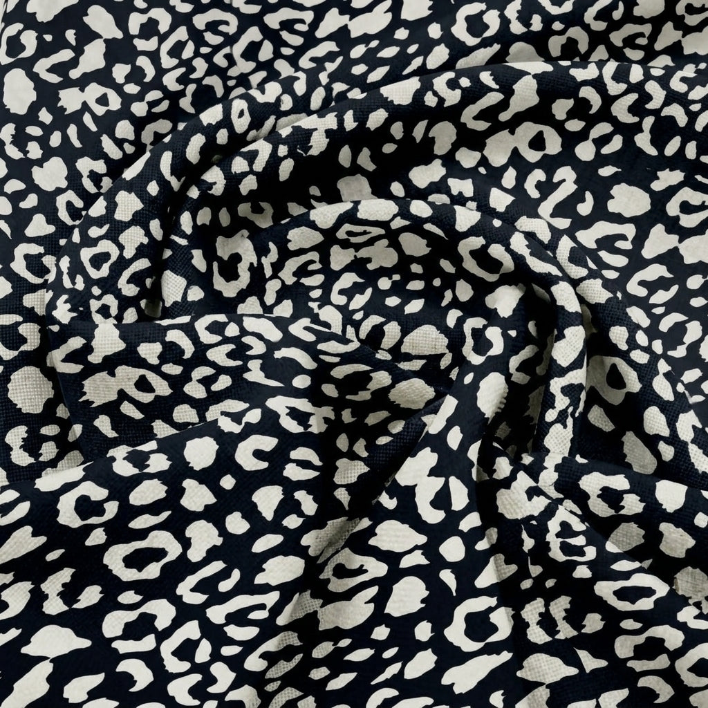Swirled Animal Print Black Animal Print Crepe Fabric