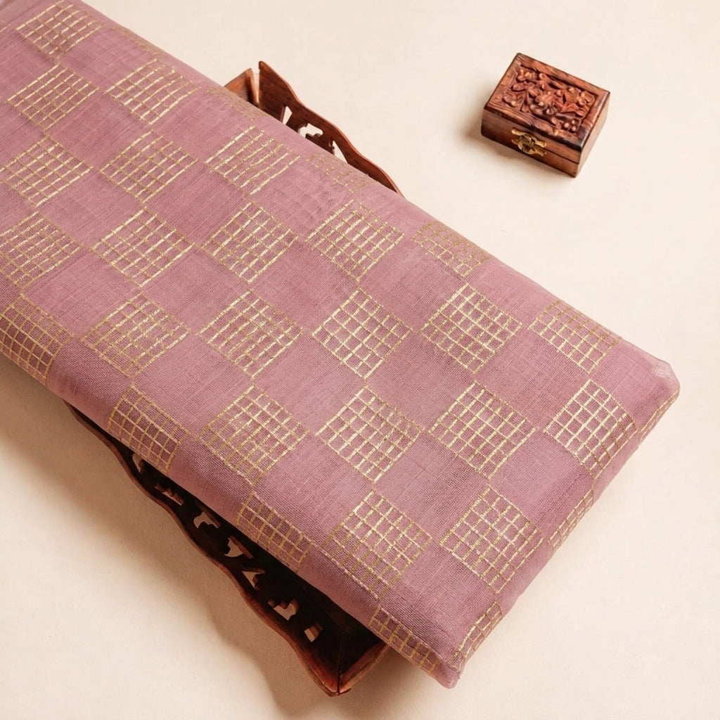 Folded Rani Pink Zari Checked Chanderi Fabric Highlighting and Texture