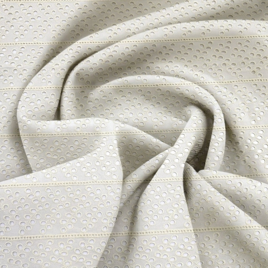 Swirled Cutwork Yellow Cutwork Cotton Fabric