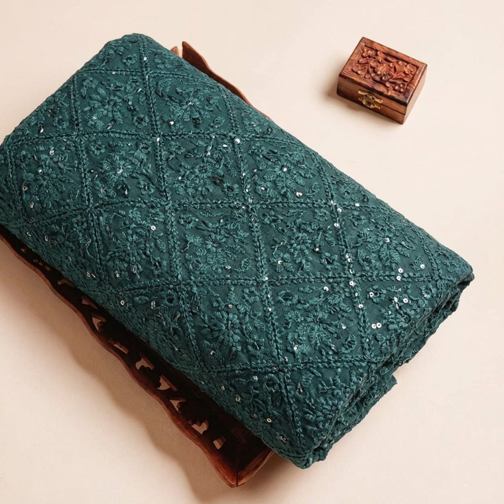 Folded Green Embroidery Georgette Fabric Highlighting Sequin and Texture
