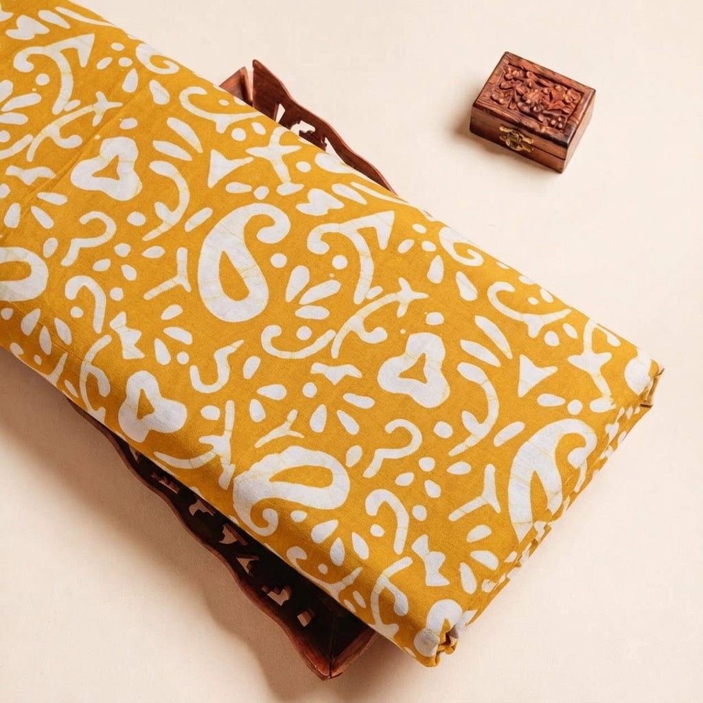Folded Yellow Batik Cotton Fabric Highlighting and Texture