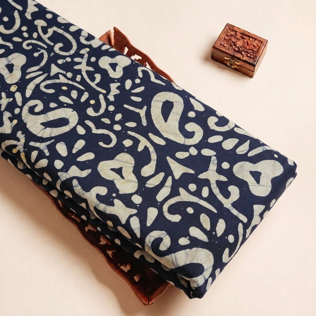 Folded Indigo Batik Cotton Fabric Highlighting Paisley and Texture