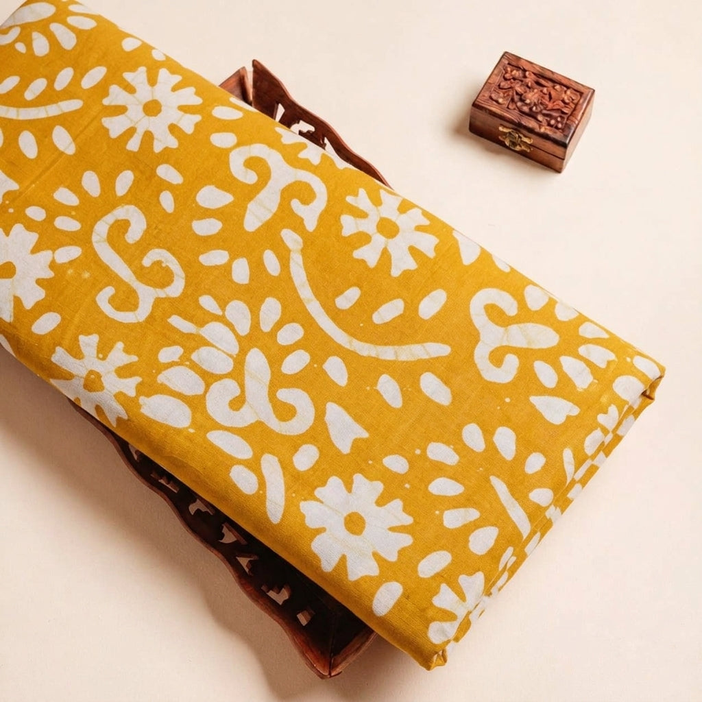 Folded Yellow Batik Cotton Fabric Highlighting and Texture