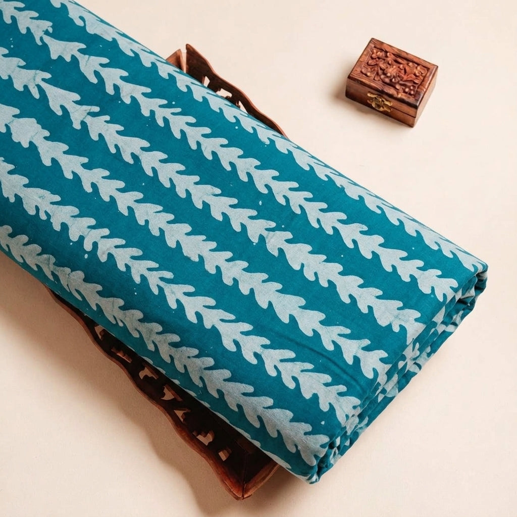 Folded Green Batik Cotton Fabric Highlighting and Texture
