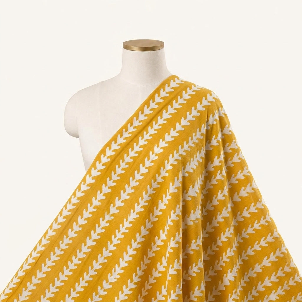 Batik Yellow Batik Cotton Fabric Draped as a saree