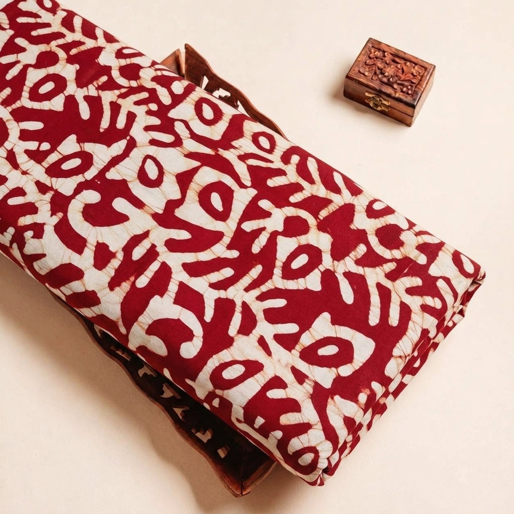 Folded Red Batik Cotton Fabric Highlighting and Texture