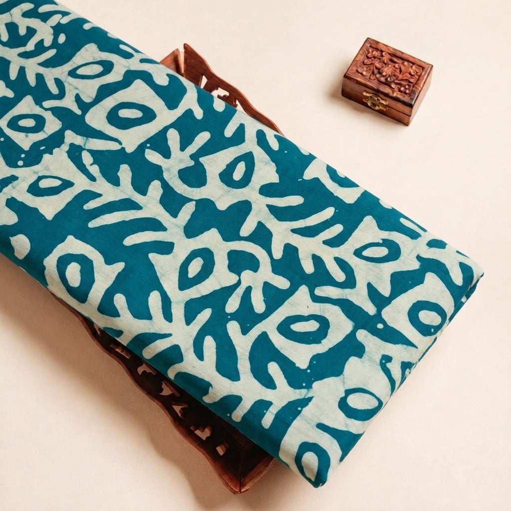 Folded Green Batik Cotton Fabric Highlighting and Texture