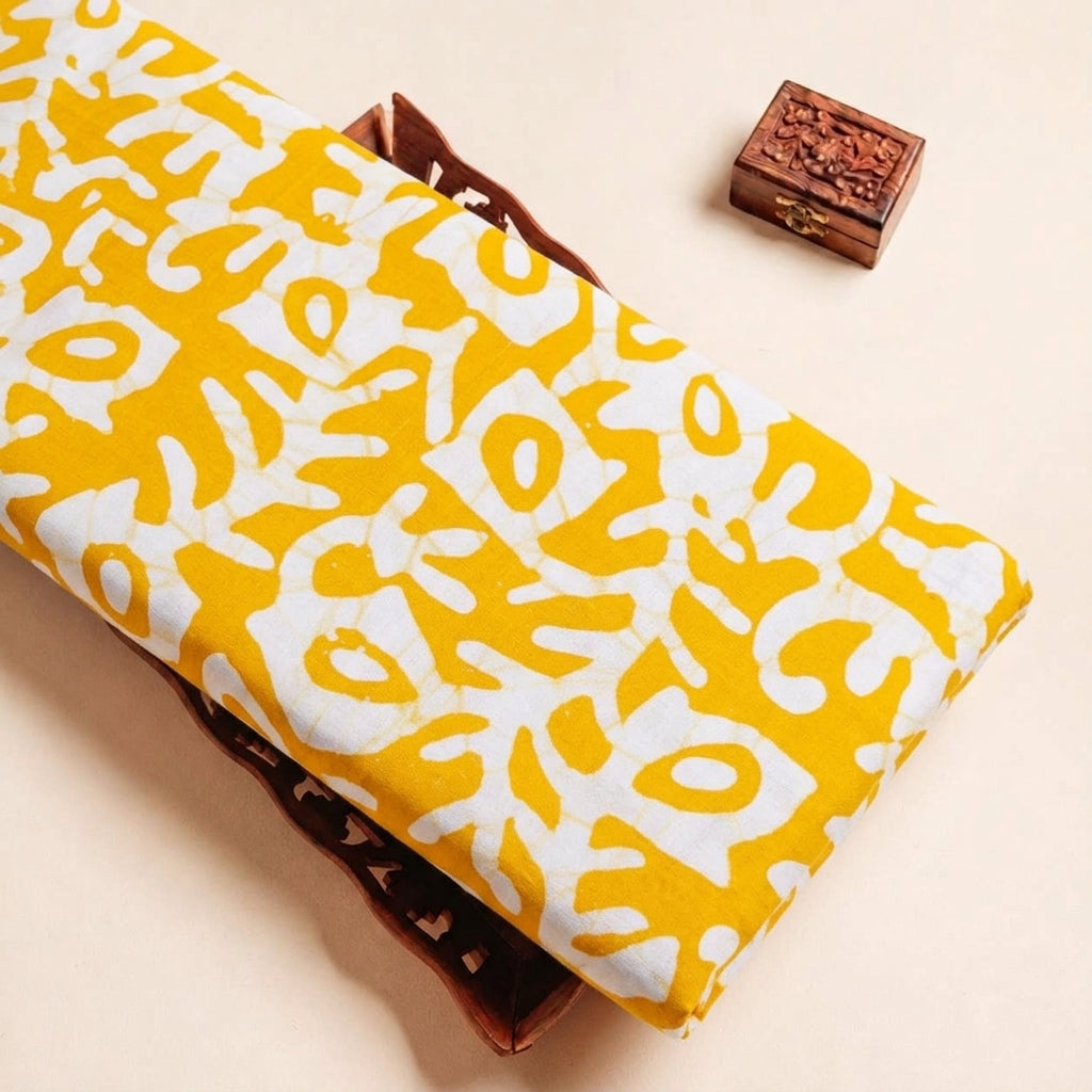 Folded Yellow Batik Cotton Fabric Highlighting and Texture