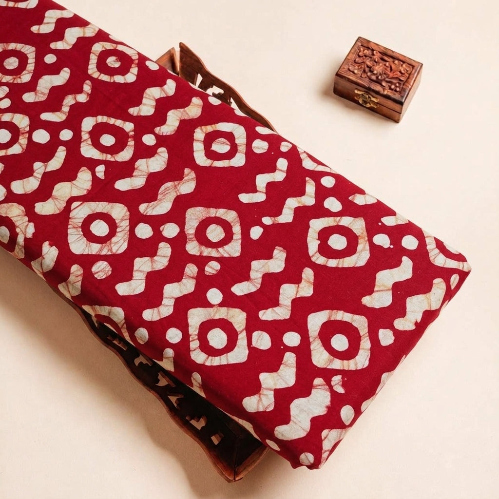 Folded Red Batik Cotton Fabric Highlighting and Texture