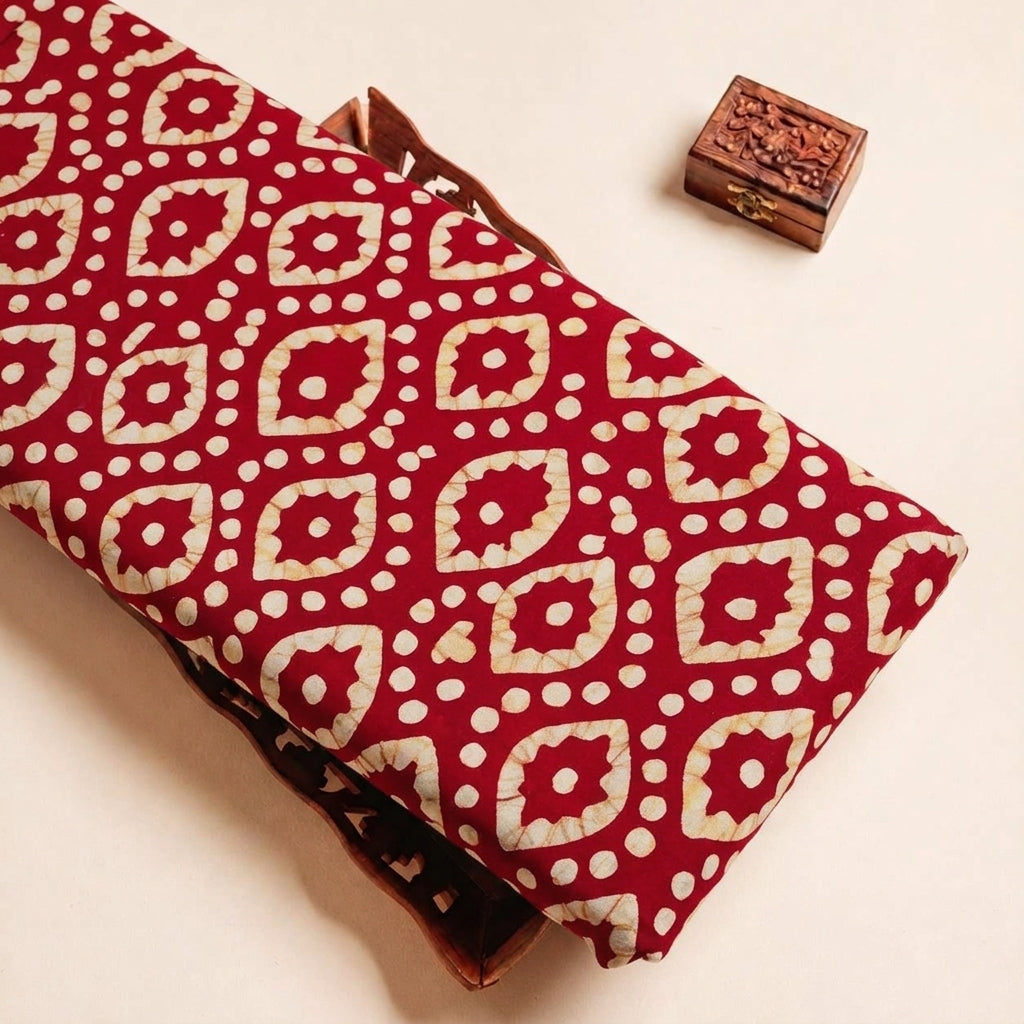 Folded Red Batik Cotton Fabric Highlighting and Texture