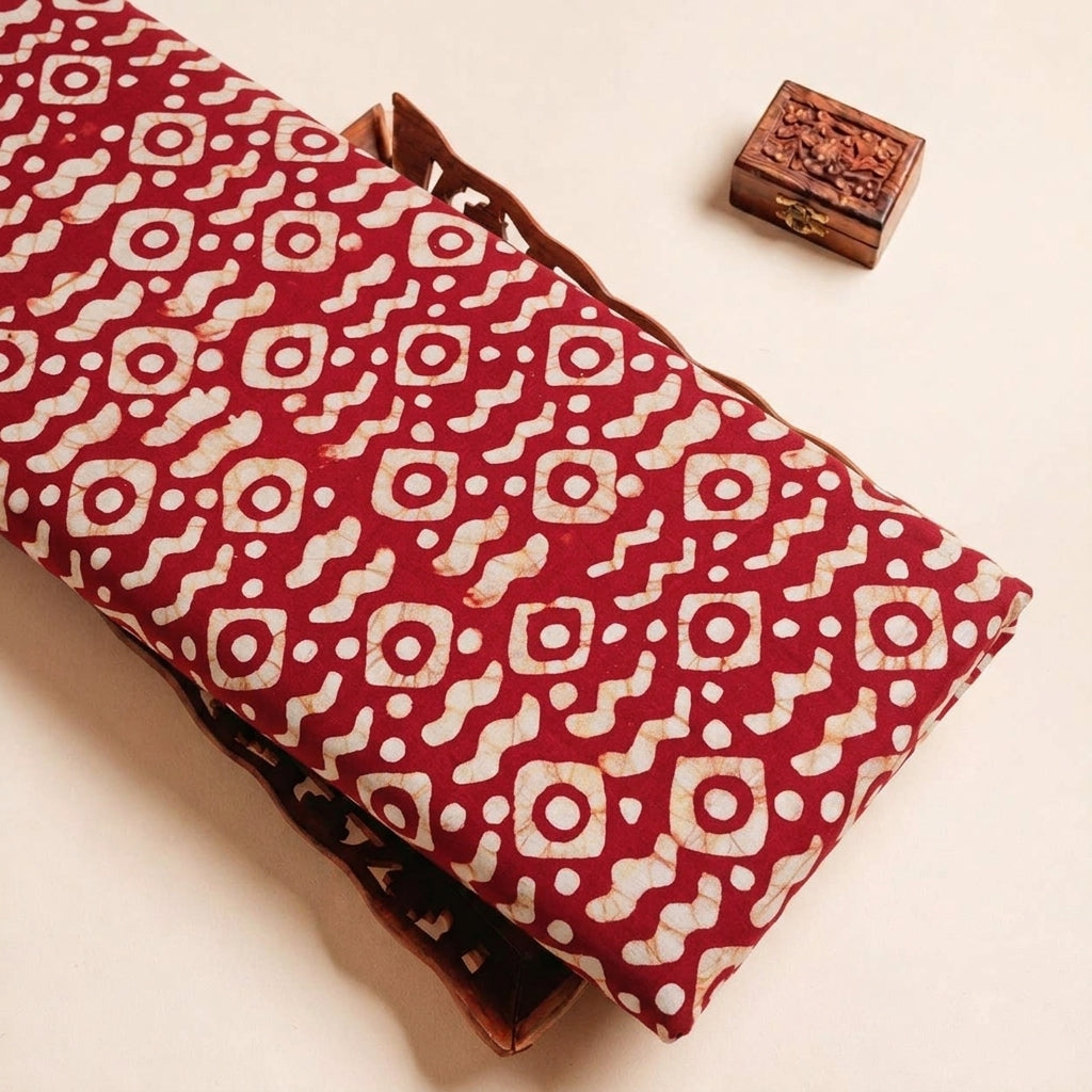 Folded Red Batik Cotton Fabric Highlighting and Texture