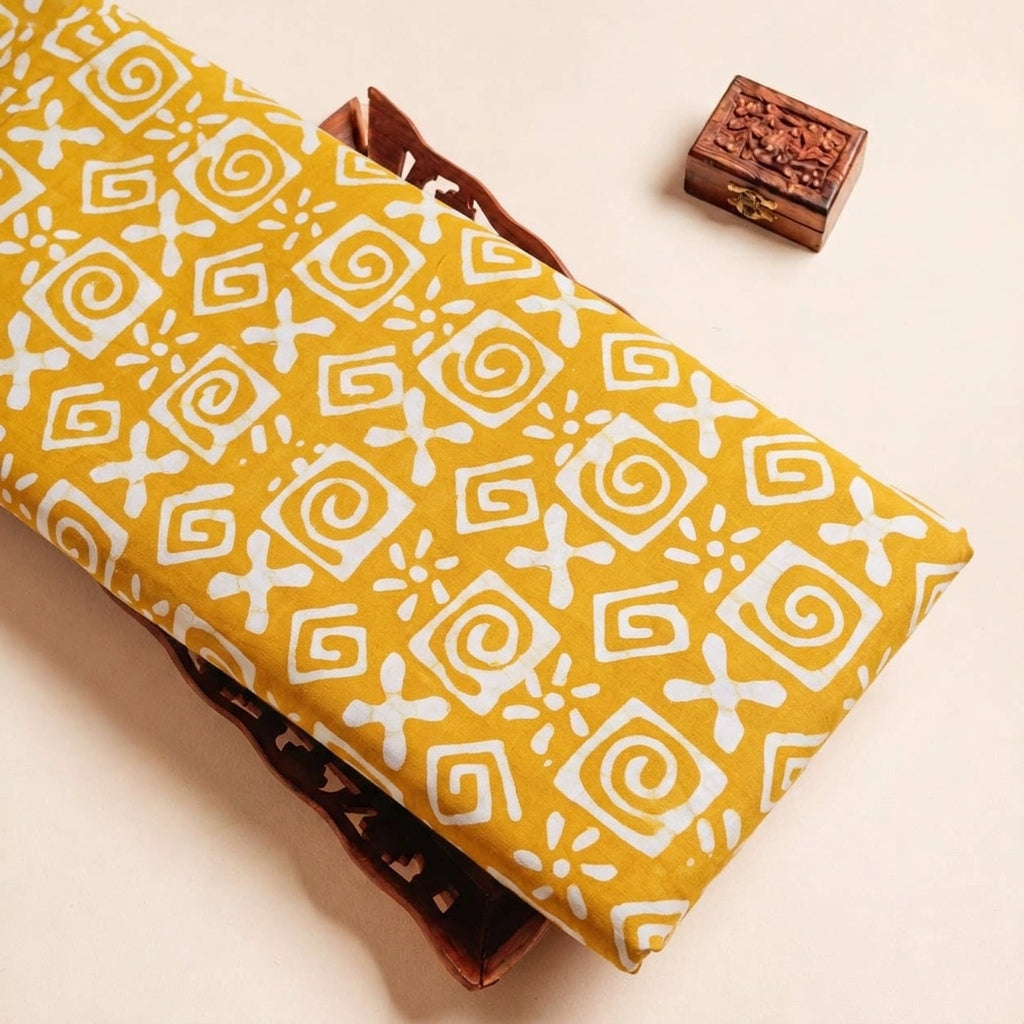 Folded Yellow Batik Cotton Fabric Highlighting and Texture