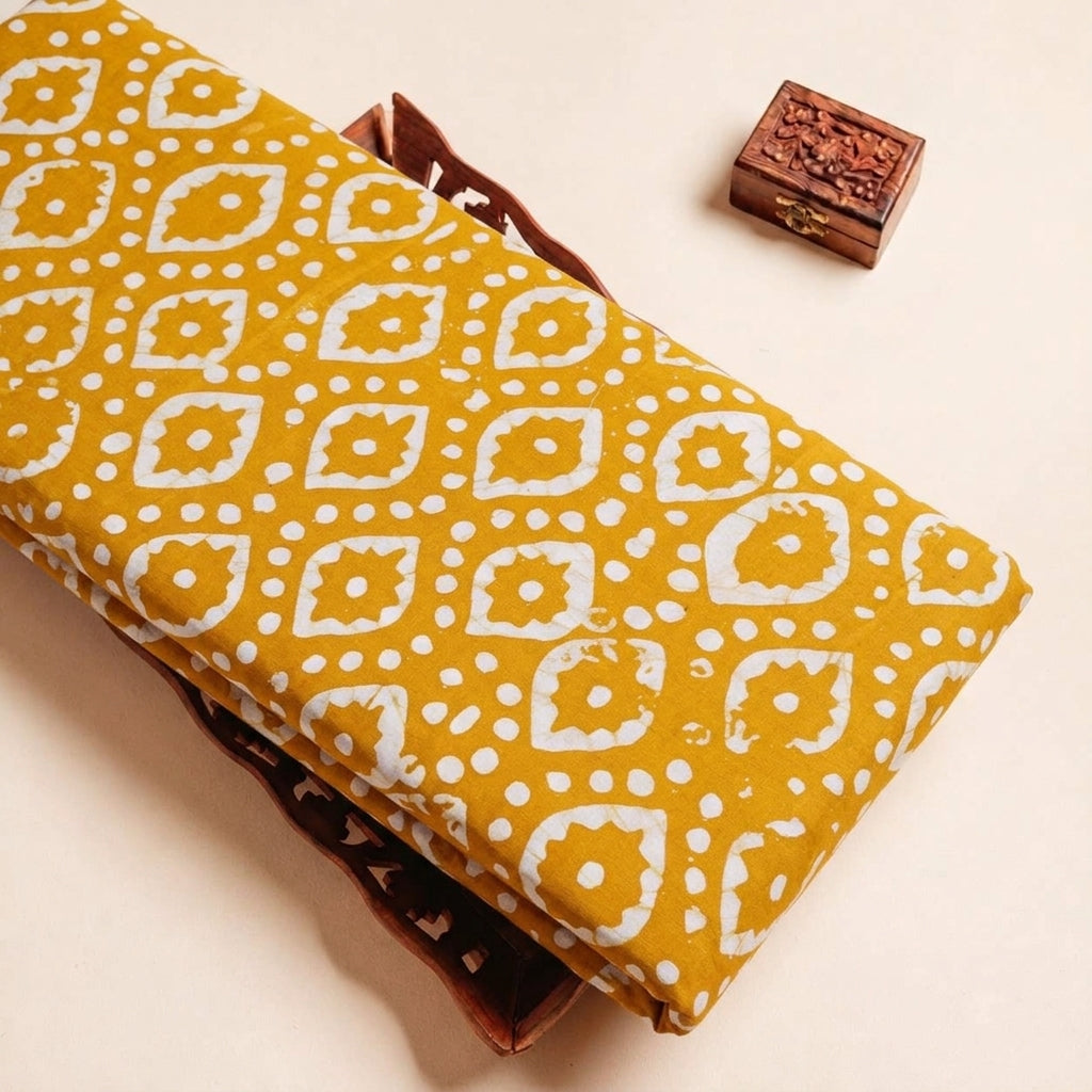 Folded Yellow Batik Cotton Fabric Highlighting and Texture