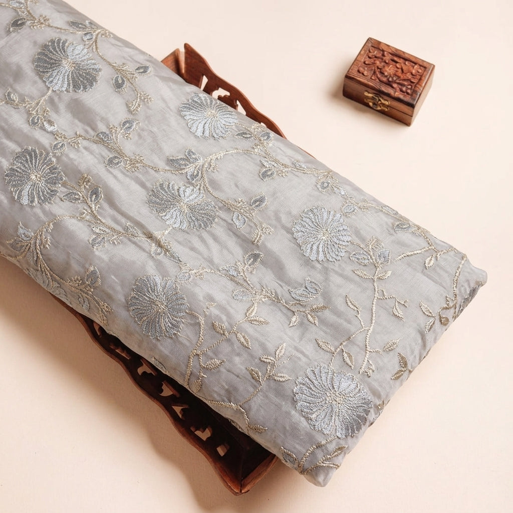 Embroidery Grey Embroidery Semi Banaras Fabric on a wooden tray