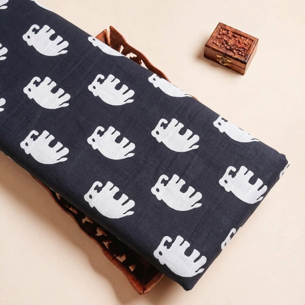 Folded Black Animal Print Cotton Fabric Highlighting and Texture