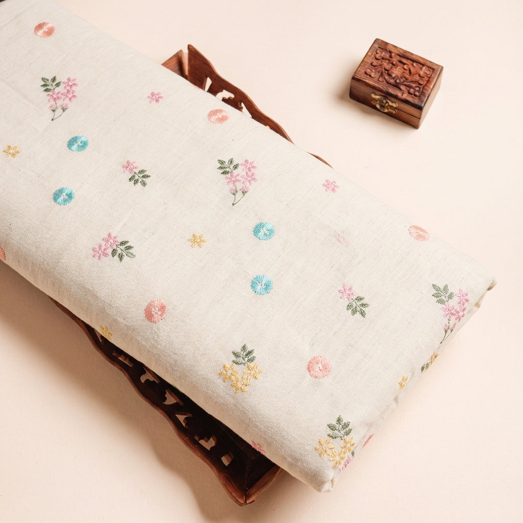 Embroidery Cream Embroidery Linen Fabric on a wooden tray