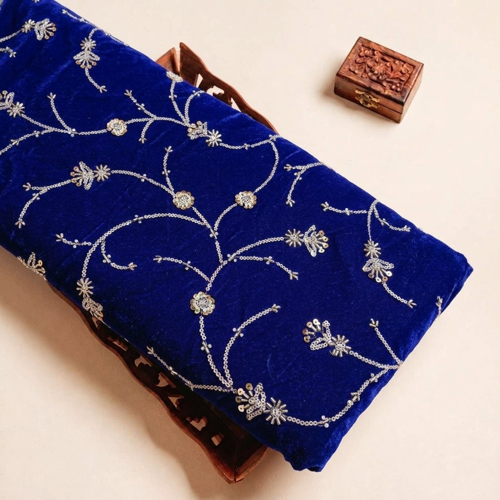 Folded Purple Embroidery Velvet Fabric Highlighting Thread Work Floral Stone and Texture