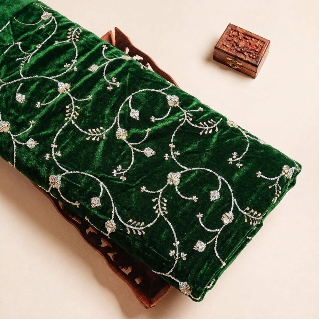 Folded Green Embroidery Velvet Fabric Highlighting Thread Work Floral and Texture