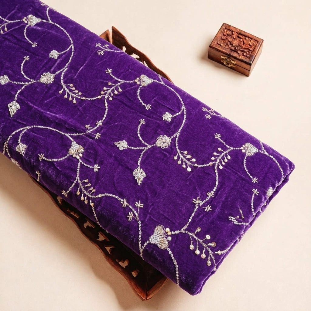Folded Violet Embroidery Velvet Fabric Highlighting Thread Work Floral and Texture
