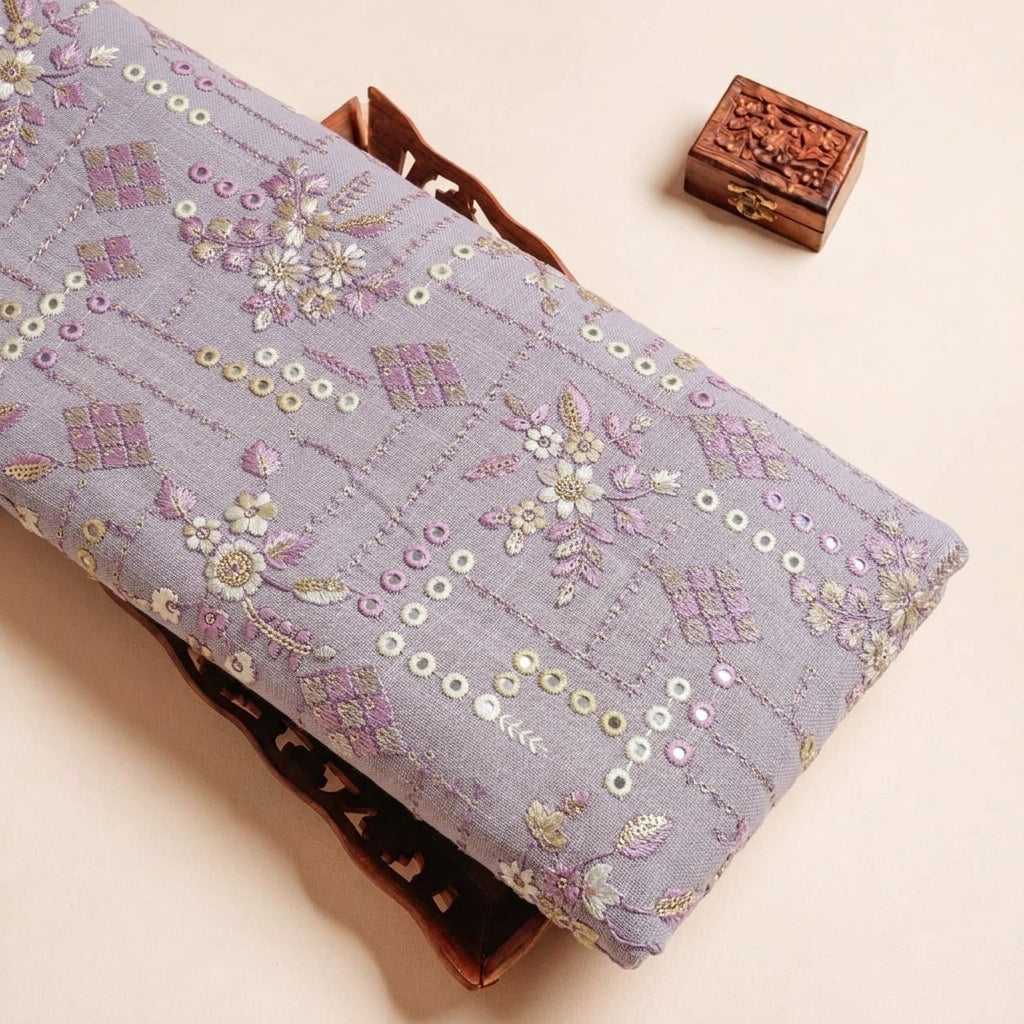 Folded Muave Embroidery Linen Fabric Highlighting Mirror Work Floral Thread Work and Texture