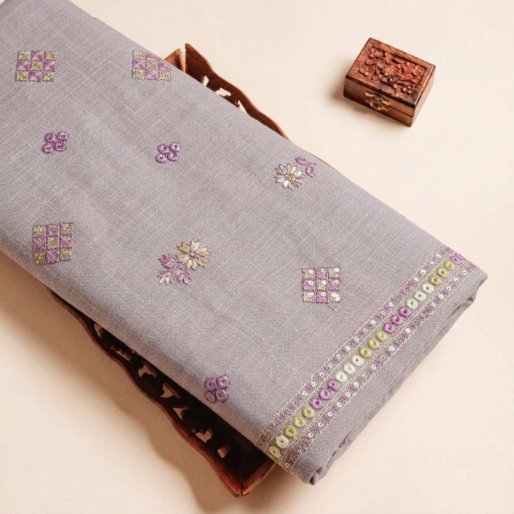 Folded Muave Embroidery Linen Fabric Highlighting Mirror Work Floral Thread Work and Texture