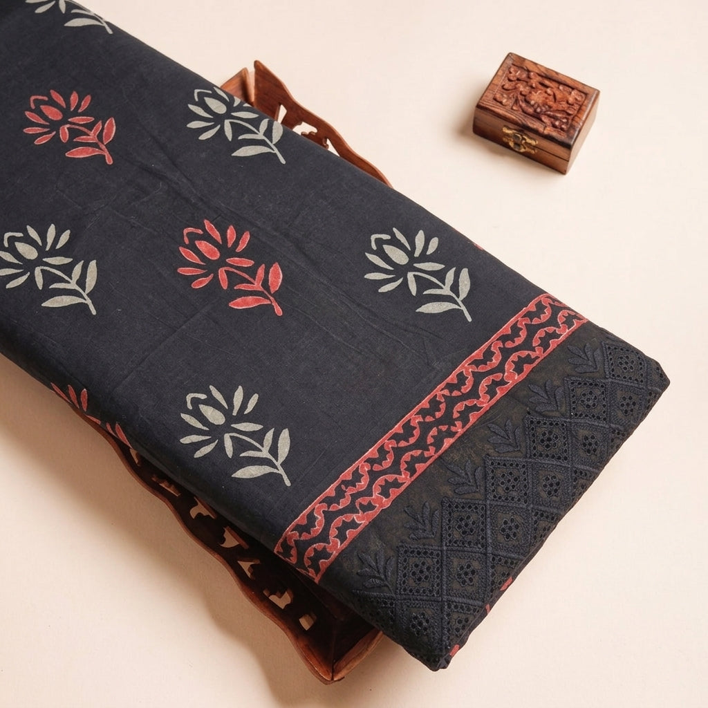 Cutwork Black Cutwork Cotton Fabric on a wooden tray