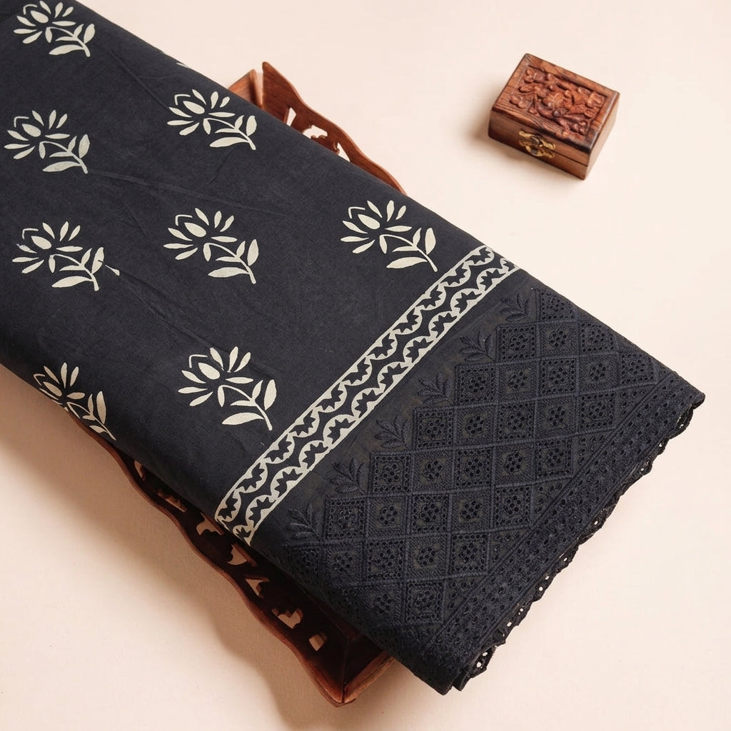 Cutwork Black Cutwork Cotton Fabric on a wooden tray