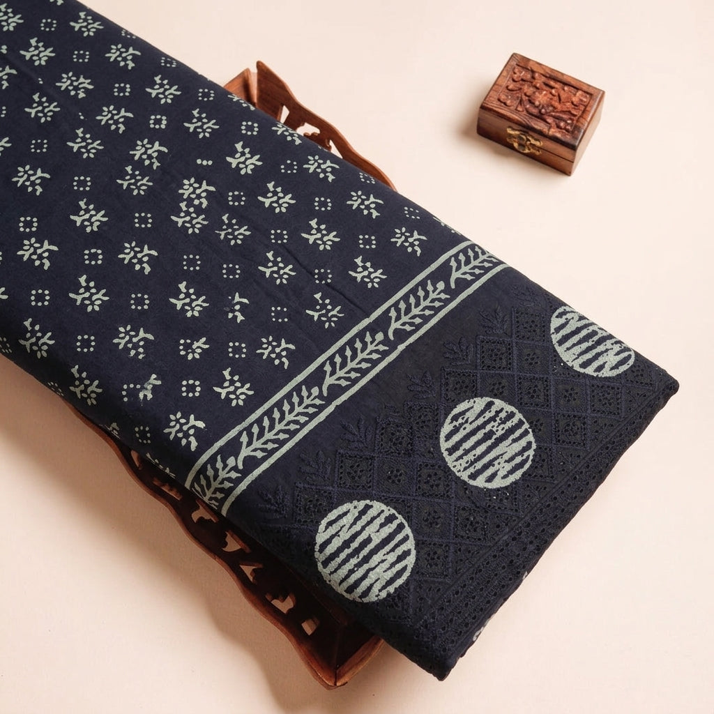 Cutwork Black Cutwork Cotton Fabric on a wooden tray