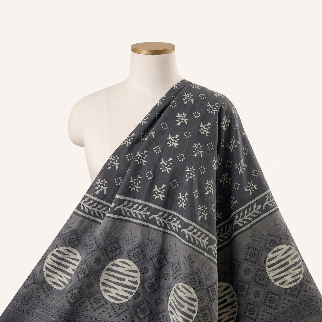 Cutwork Black Cutwork Cotton Fabric Draped as a saree