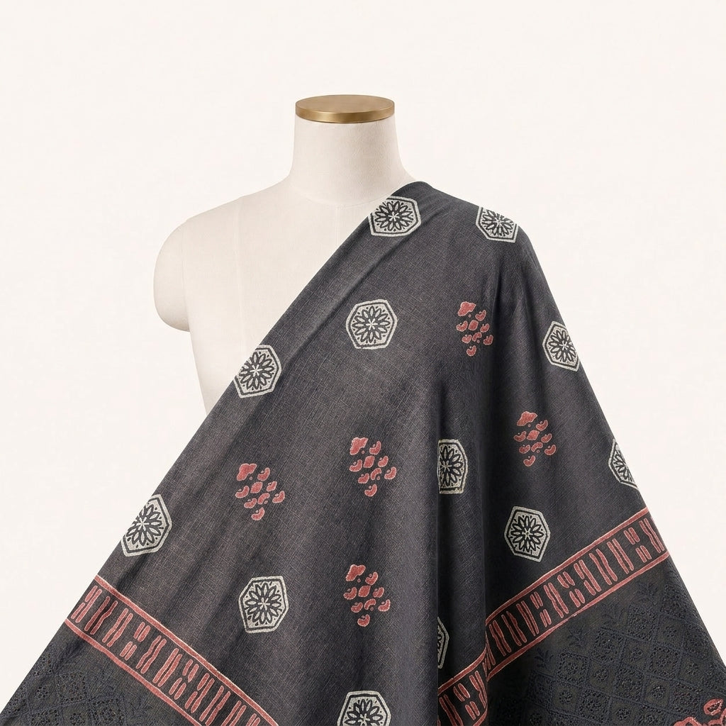 Cutwork Black Cutwork Cotton Fabric Draped as a saree